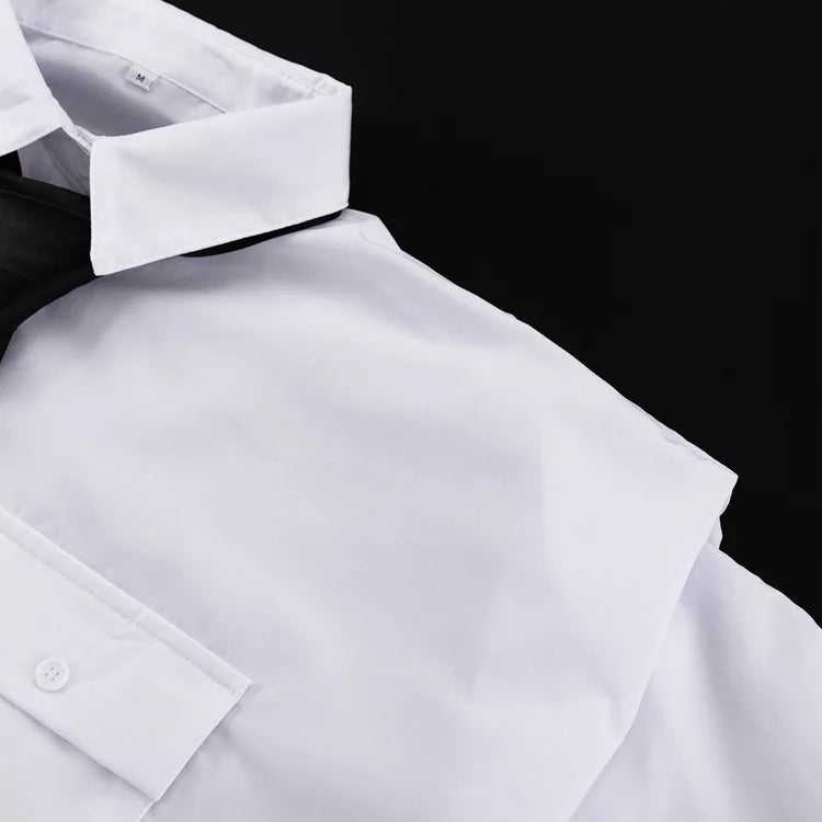White dress shirt with collar and cuff against a black background