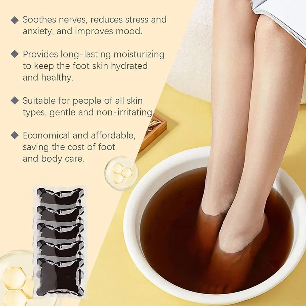 Person soaking feet in a bowl of brown liquid with foot care product packaging and text benefits displayed.