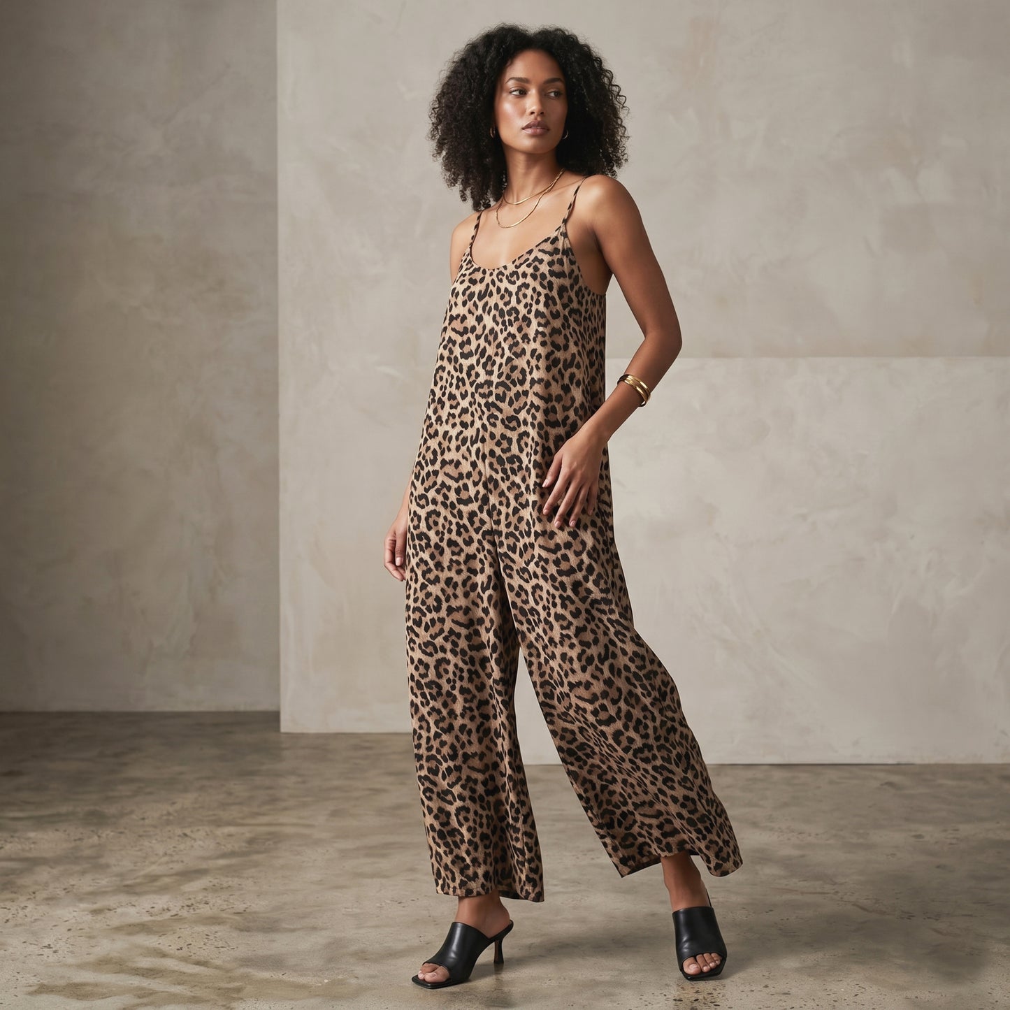 Woman wearing a leopard print jumpsuit against a neutral background fall winter 2026 fashion week