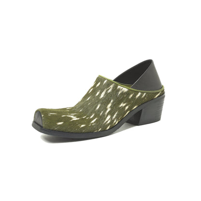 Green clog shoe with white pattern on a white background