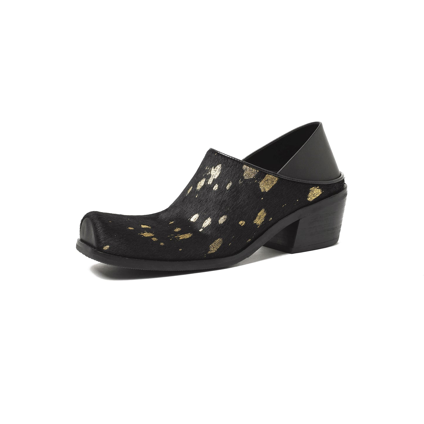 Black shoe with gold speckles on a white background
