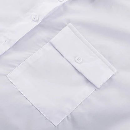 Close-up of a white dress shirt with button details on a light gray background